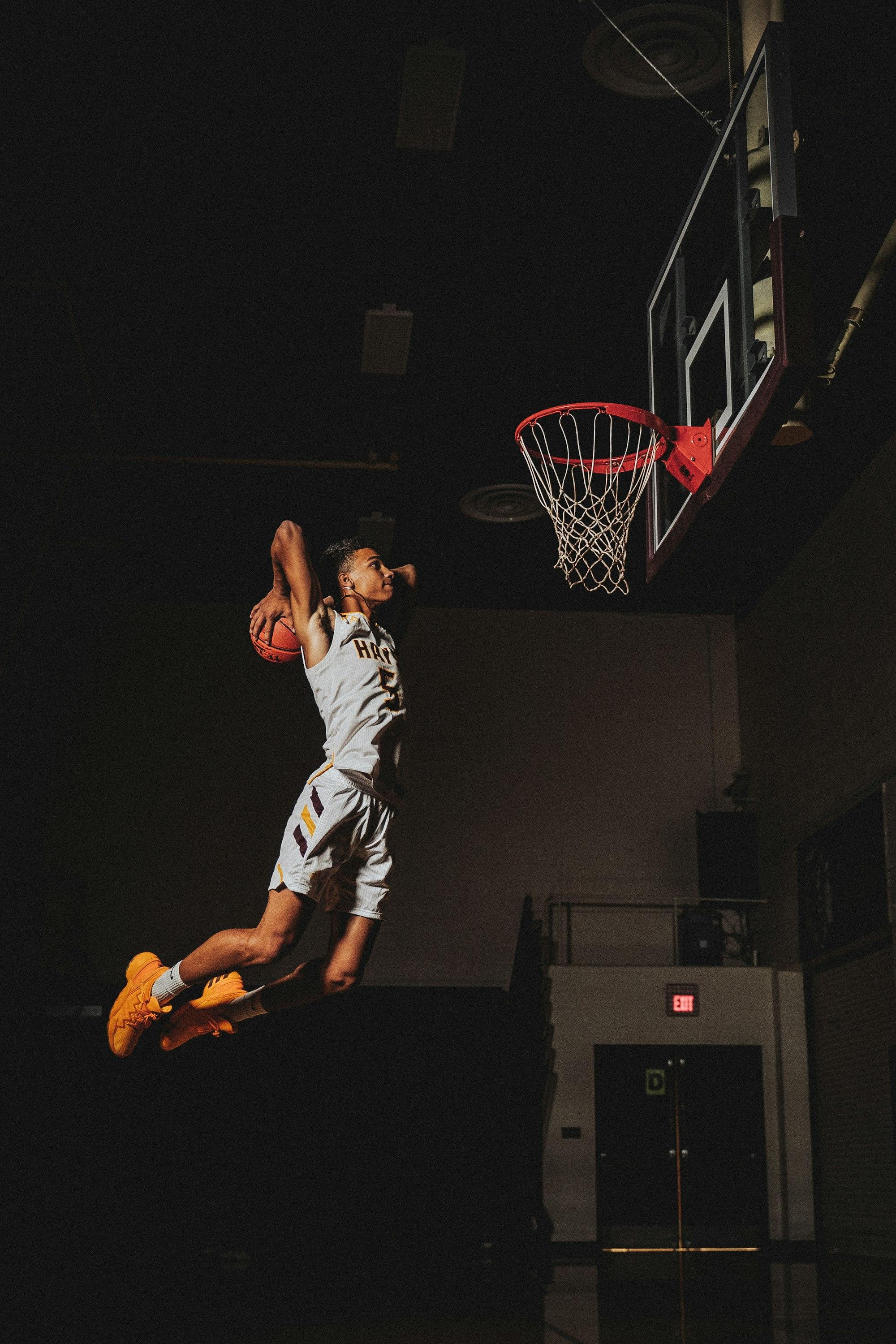 Basketball player rising for a dunk