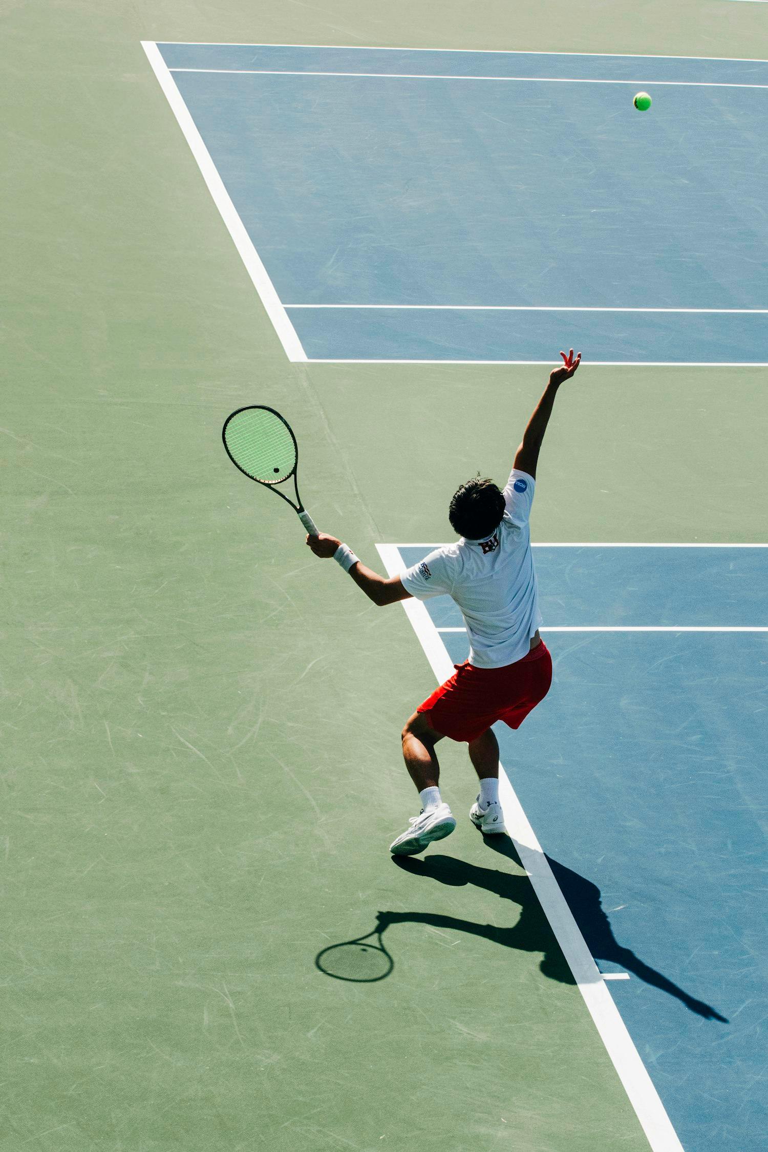 Tennis player serving