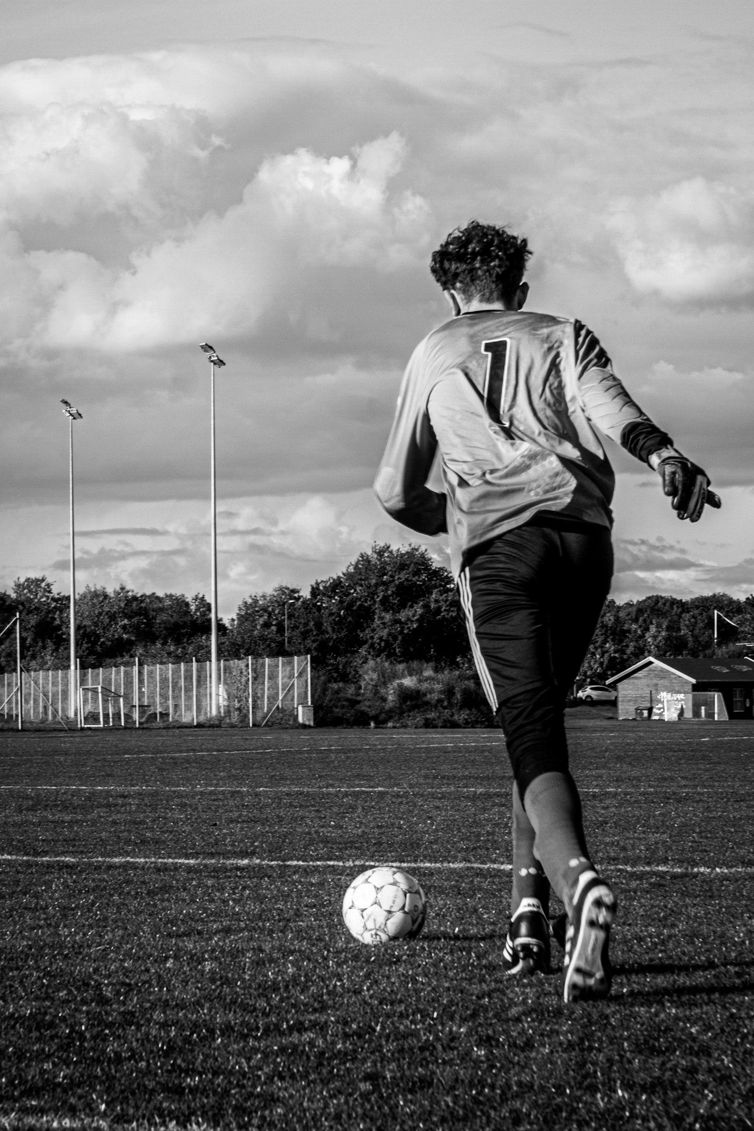 Soccer player chasing the ball